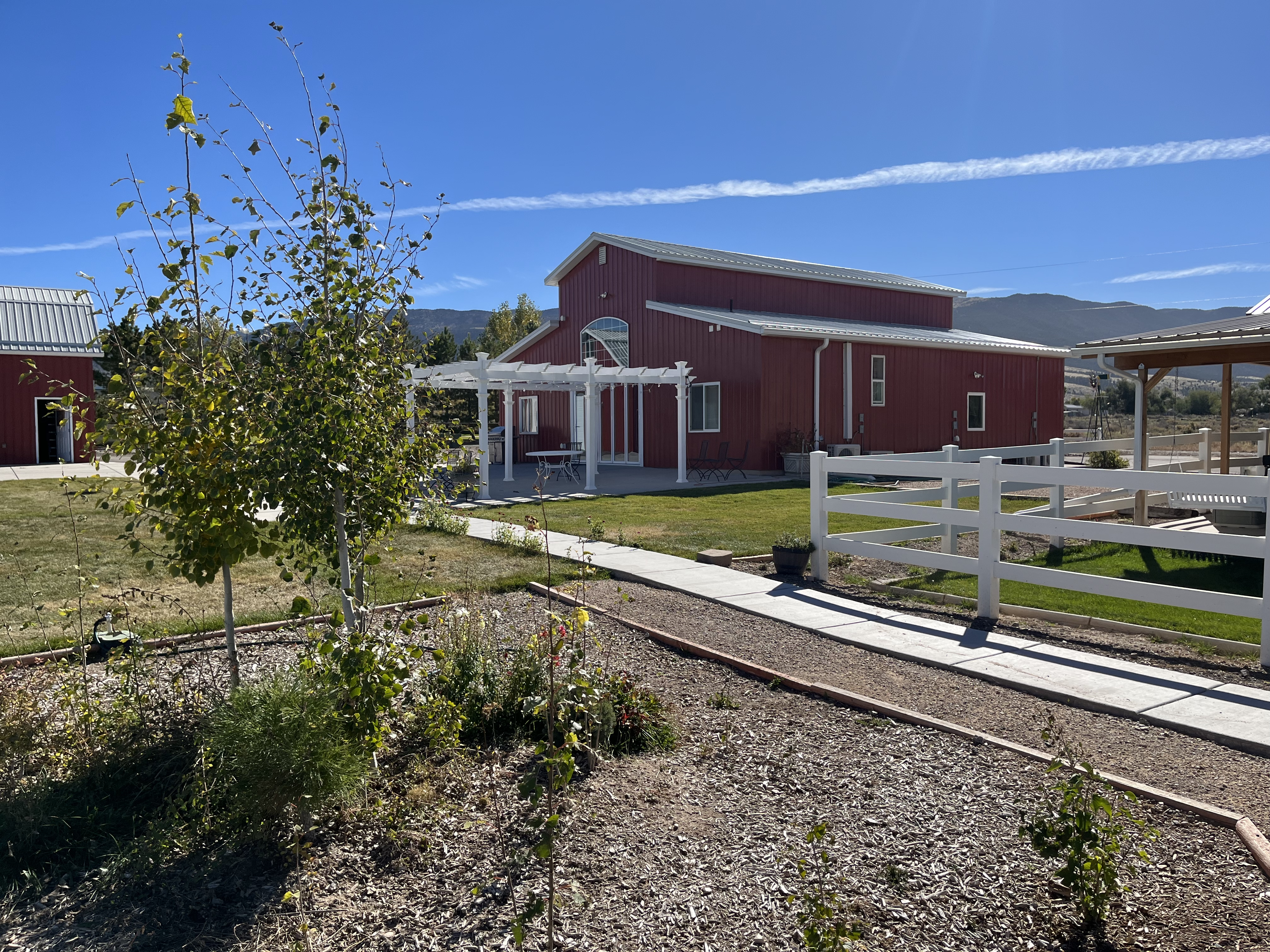 Barn and pergola on a sunny day